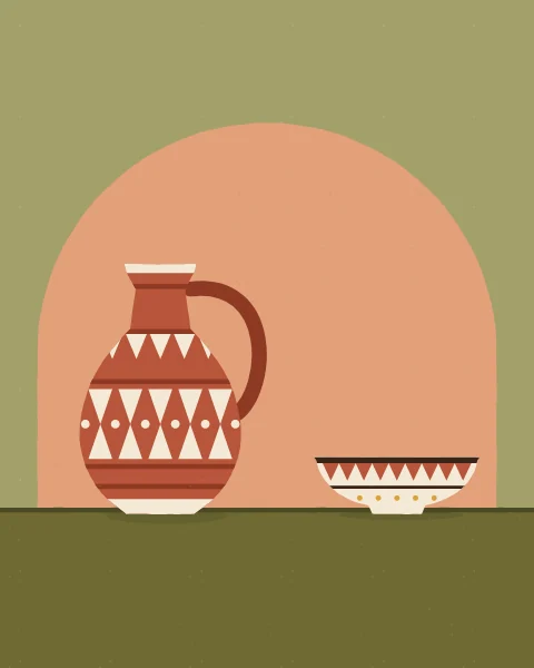 A terracotta jug with cream triangles and bow ties stands beside a small patterned bowl in an arched niche.