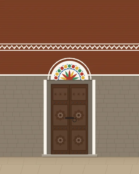 A carved wooden door in a stone storey of a Sanaa tower house, crowned by a half-moon window of coloured glass and white gypsum friezes on brick.