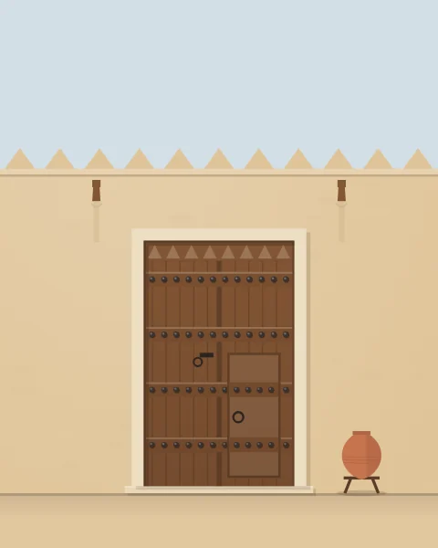 A plain teak door with rows of iron studs and a small door within it, set in a mud-plaster wall with triangular crenellations and wooden water spouts.