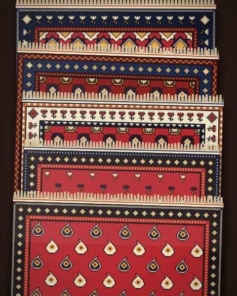 Five crimson and madder rugs overlapped like roof tiles, so that each shows only its top border, its striped kilim end and its fringe.