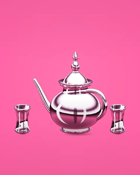 A chrome Moroccan teapot stands between two tea glasses on a hot pink ground.