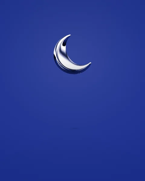 A small chrome crescent hangs high in a wide navy ground, catching a little light.