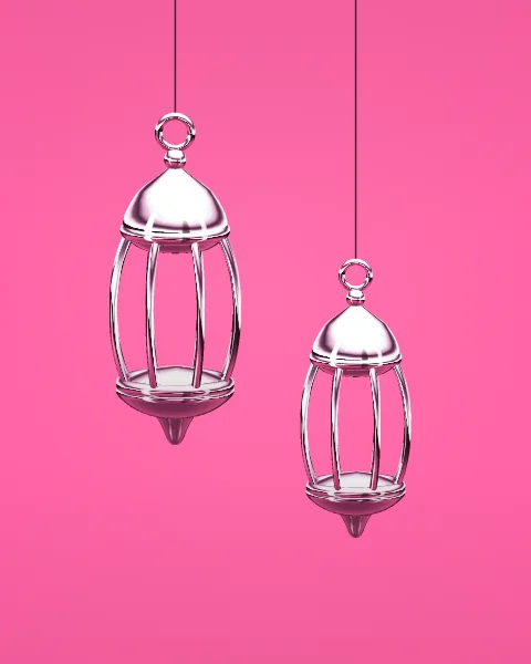 Two chrome lanterns hang side by side at different heights on a hot pink ground.