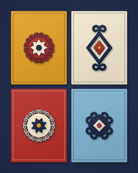 Six felt panels hung on a navy wall, each with its own colour and ornament: an octagon, an open lozenge, a rosette, a four-horned lozenge, a wreath and a squared-off star.