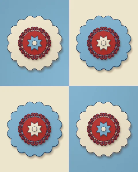 Large squares of sky blue and cream, each holding a scalloped felt medallion of red horn scrolls in the opposite colour.