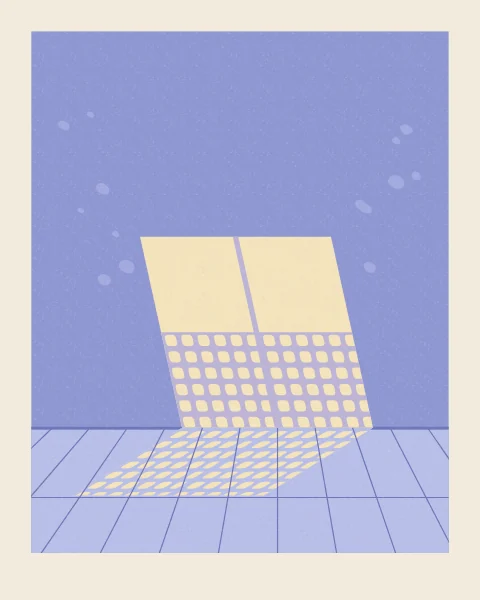 Sun through a latticed window falls on a periwinkle wall and runs across the floor as rows of small rounded lights. The upper panes are plain glass, so the light there is whole.