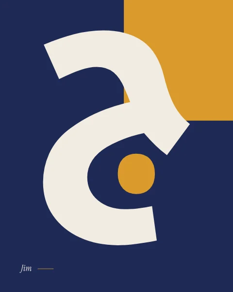 The letter jim in heavy Noto Kufi, bone on midnight blue against a saffron block, its dot picked out in saffron.