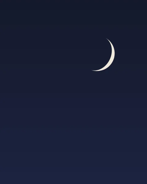 A slim pale crescent alone in a clear midnight-blue sky.