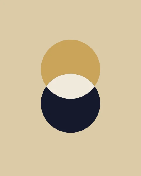 A gold disc and an ink disc overlap, leaving a pale lens where they meet.