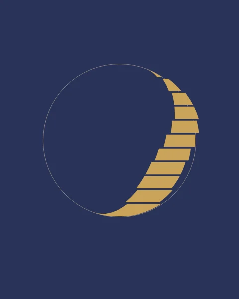 A gold crescent cut into thin bands that slide gently left and right on indigo.
