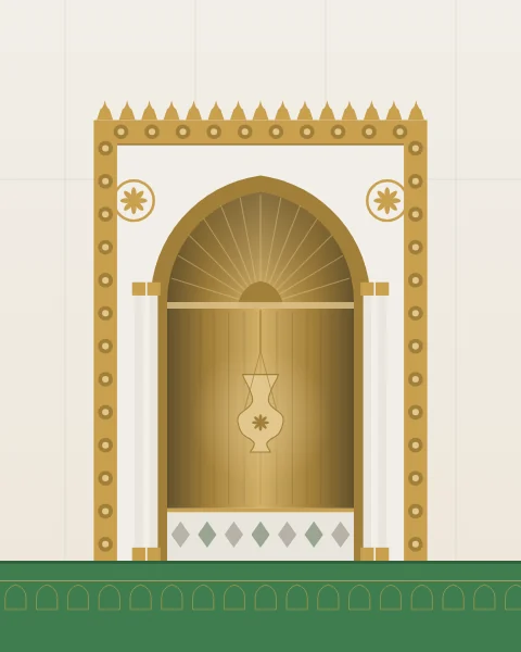 A marble and gold prayer niche framed by twin columns, its hood fluted like a shell, above a green carpet.