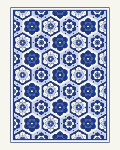A framed panel of hexagonal tiles in white, cobalt and pale blue, each with a six-petalled rosette, inside a cobalt double rule on plain slip.