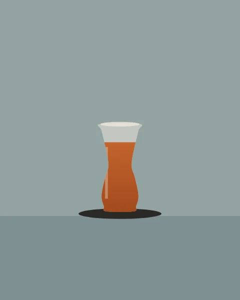 A small waisted tea glass, filled with amber tea, stands on a dark saucer on a grey-blue ground.
