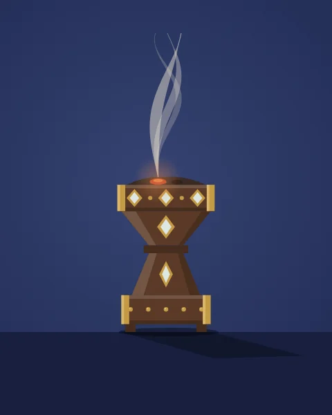 A wooden incense burner studded with brass stands on a blue ground as a ribbon of smoke rises from the glowing coal.