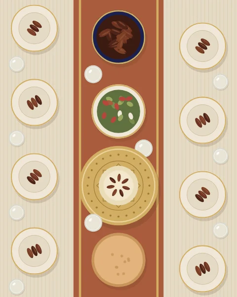 A long table seen from directly above. A terracotta runner carries a brass platter of rice and dates, bowls of dates, soup, salad and bread, and place settings line both sides, each plate holding dates beside a glass of water.