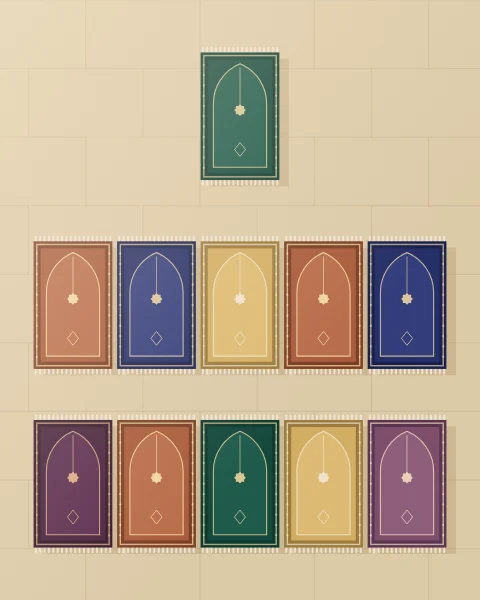Prayer mats laid in straight rows on pale courtyard stone, seen from directly above. Each mat has a pointed arch at its head, and the last row is only half filled.