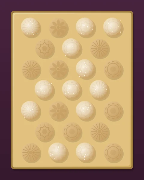 A brass baking tray of round maamoul seen from above, each biscuit pressed with a different carved pattern, some dusted with sugar.