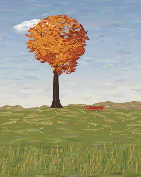 A tree in full orange and red autumn colour stands on a grassy rise, with a prayer mat laid on the grass beside it.