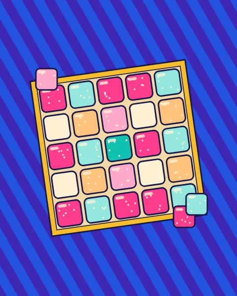 A gold box of pink, mint and cream sweets on a striped blue cloth, with a few loose pieces beside it.