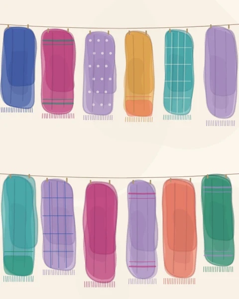 Rows of headscarves pegged on washing lines, striped, dotted, checked and plain, in every colour of the collection.