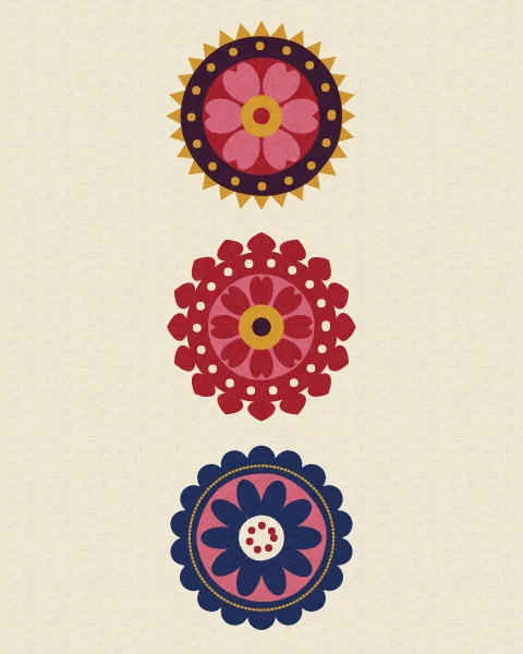 Three large rosettes in saffron and aubergine, crimson and rose, and indigo, set in a row on ivory.