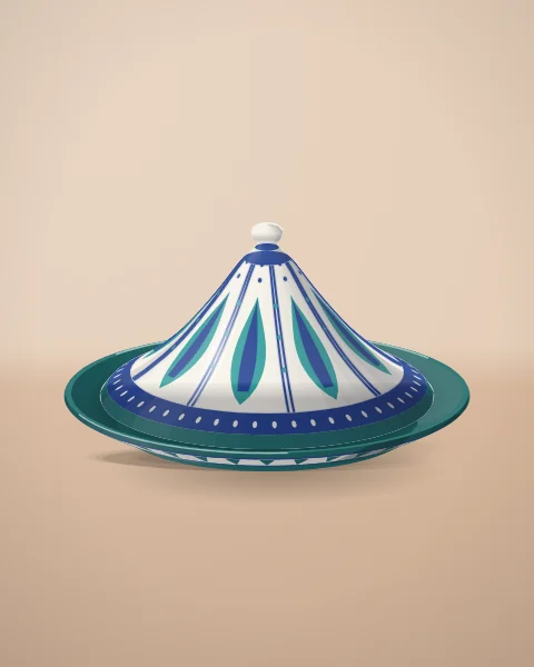 A glazed tagine with a cream conical lid painted in cobalt and turquoise flames, resting in a deep green dish.