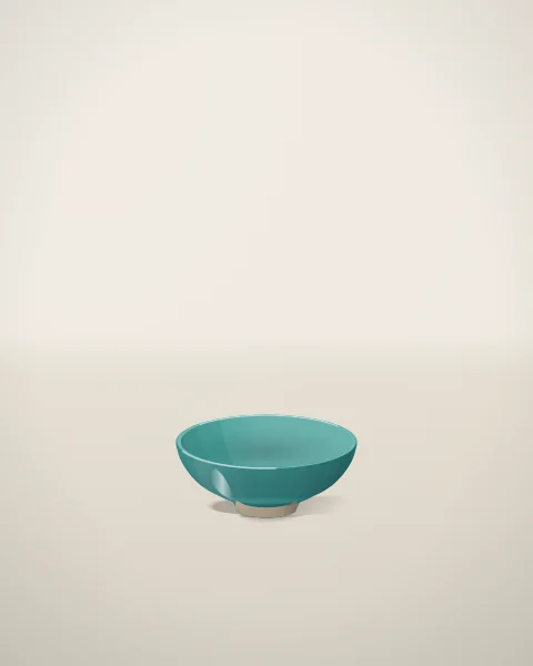 A single small turquoise bowl with a bare foot, set low on a wide expanse of pale plaster.